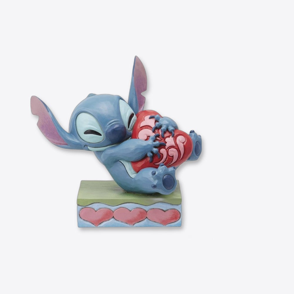 Figura enesco disney stitch abrazando un corazón (imagen 6 de 6)