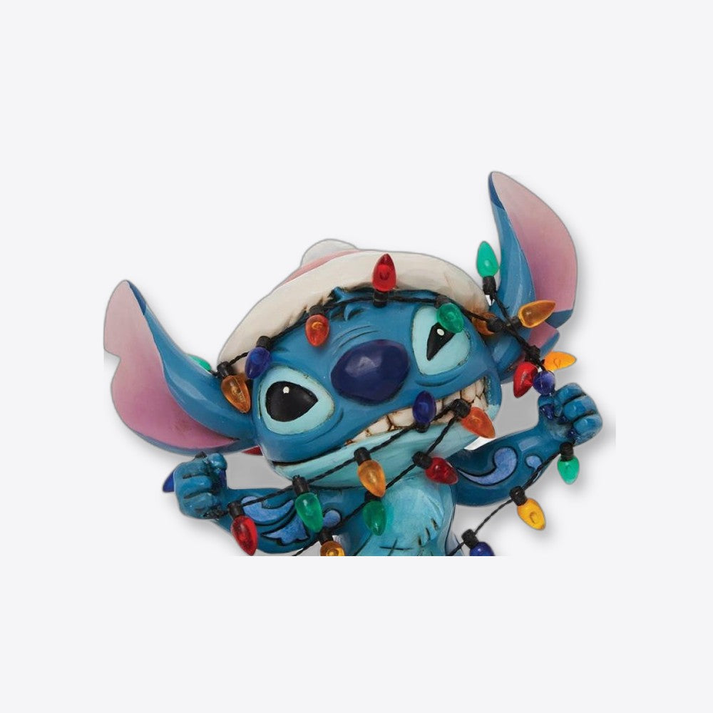 Figura enesco disney stitch envuelto en luces de navidad (imagen 3 de 6)