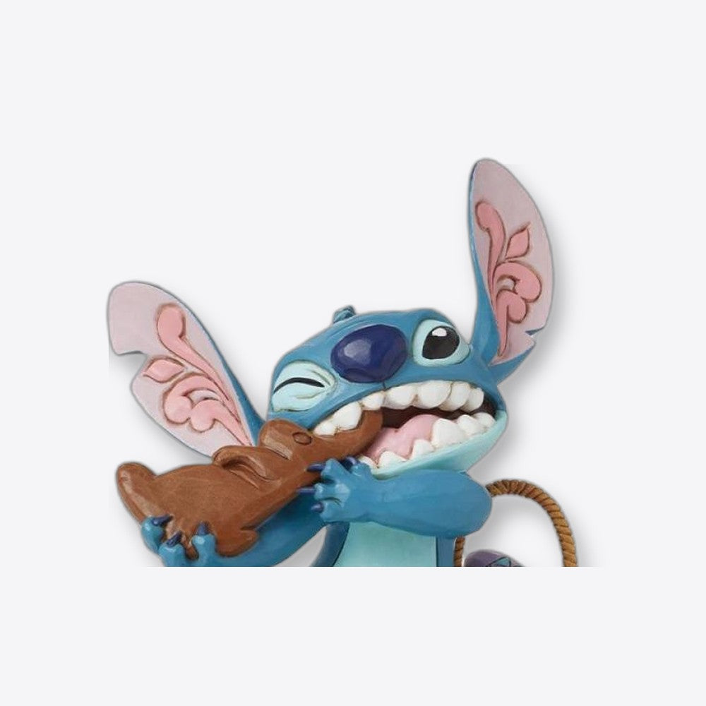 Figura enesco diseny stitch comiendo conejo de chocolate con huevos (imagen 3 de 6)