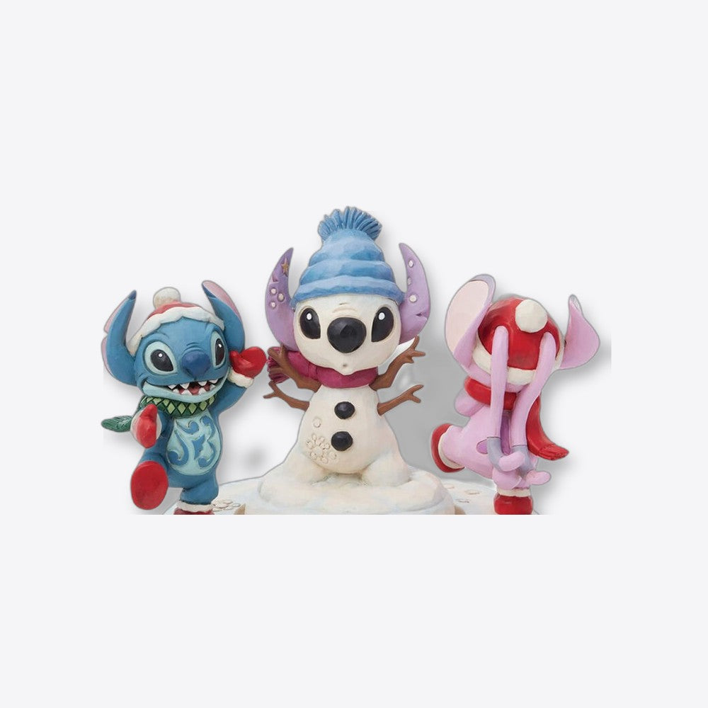 Figura decorativa enesco disney stitch y angel con muñeco de nieve rotativo (imagen 3 de 6)