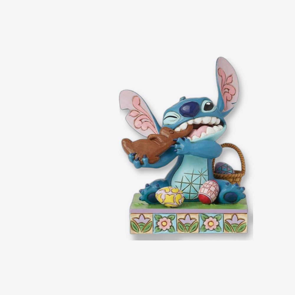 Figura enesco diseny stitch comiendo conejo de chocolate con huevos (imagen 4 de 6)