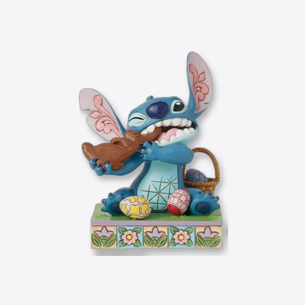 Figura enesco diseny stitch comiendo conejo de chocolate con huevos (imagen 2 de 6)